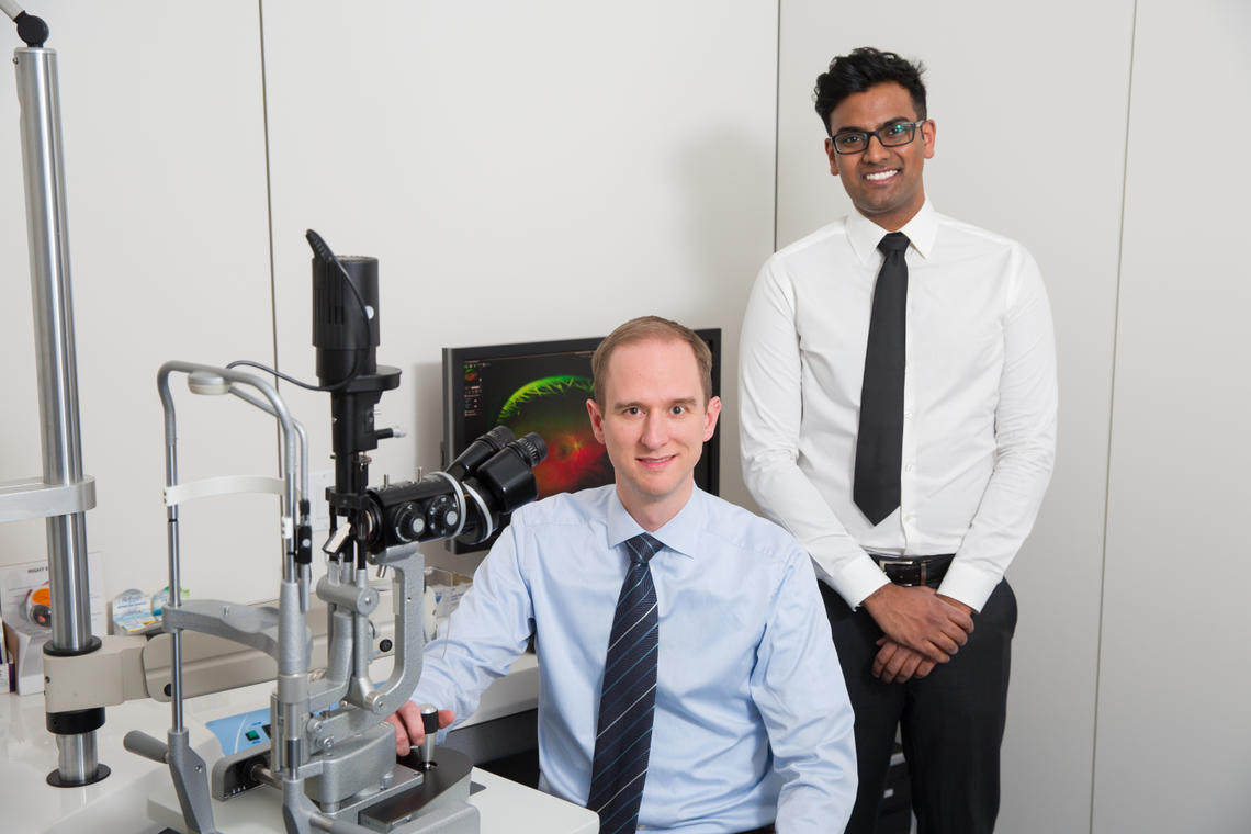 Dr. Michael Fielden, ophthalmologist and assistant clinical professor, Cumming School of Medicine (left) and Mathew Palakkamanil