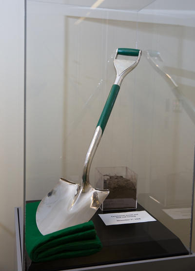 A shovel and bag of dirt saved from the 1958 campus groundbreaking ceremony are just two of the items featured in the University Library's 50th Anniversary display. 