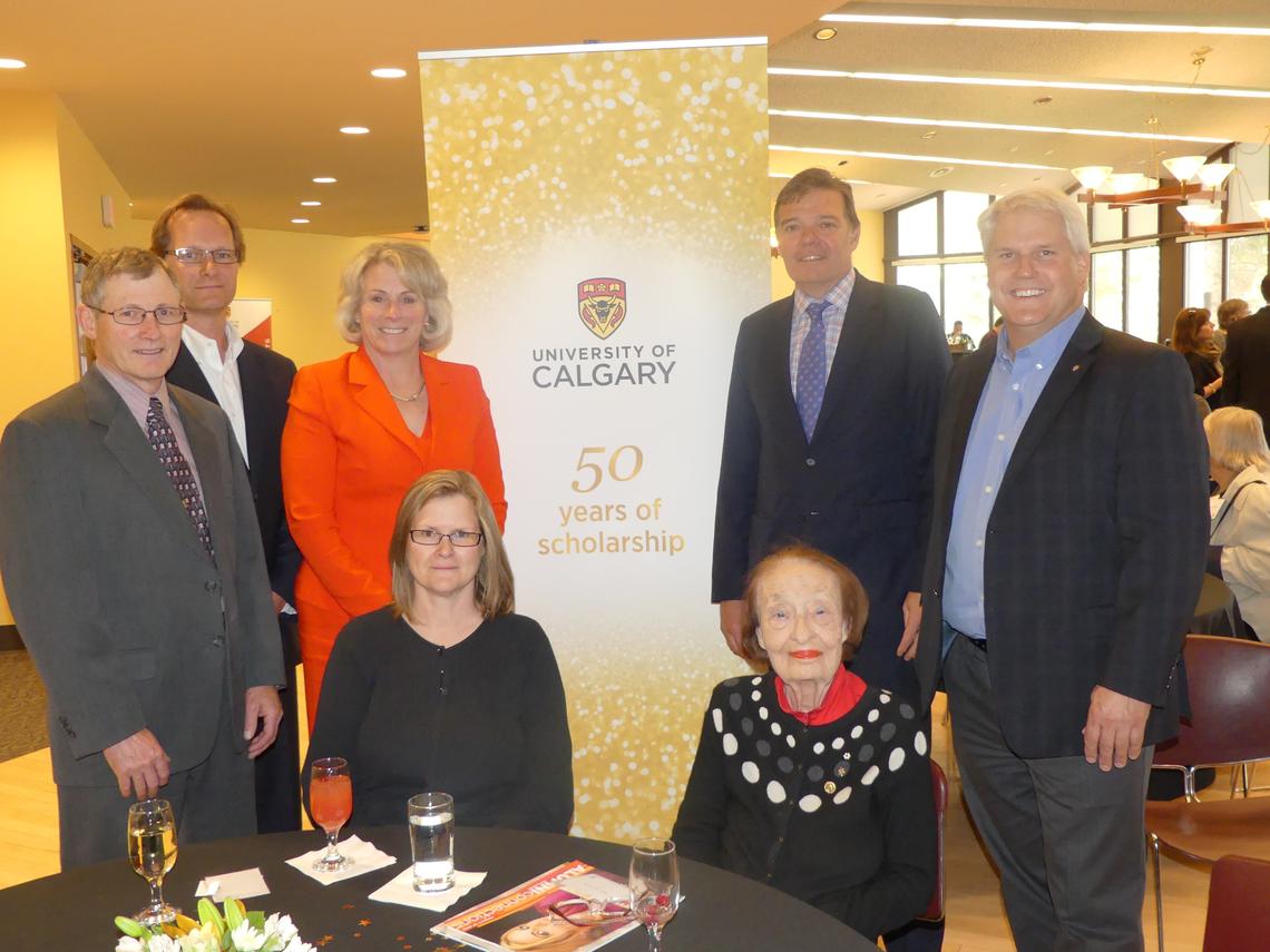 Margaret Hess, bottom right, in June 2016 at a Faculty of Arts celebration of the university's 50th anniversary. She is shown here with Michael Gibeau, John Yackel, President Elizabeth Cannon, Arts Dean Richard Sigurdson, Brian Moorman and Catherine Avramenko.