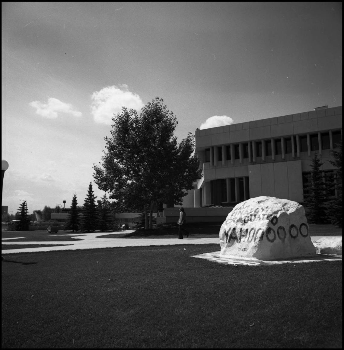 Image of The Rock sitting in its original location outside MacEwan Hall. It’s been painted with many sayings over the years – but this 1978 one makes any parent proud! Rock On! #Ucalgary50. 