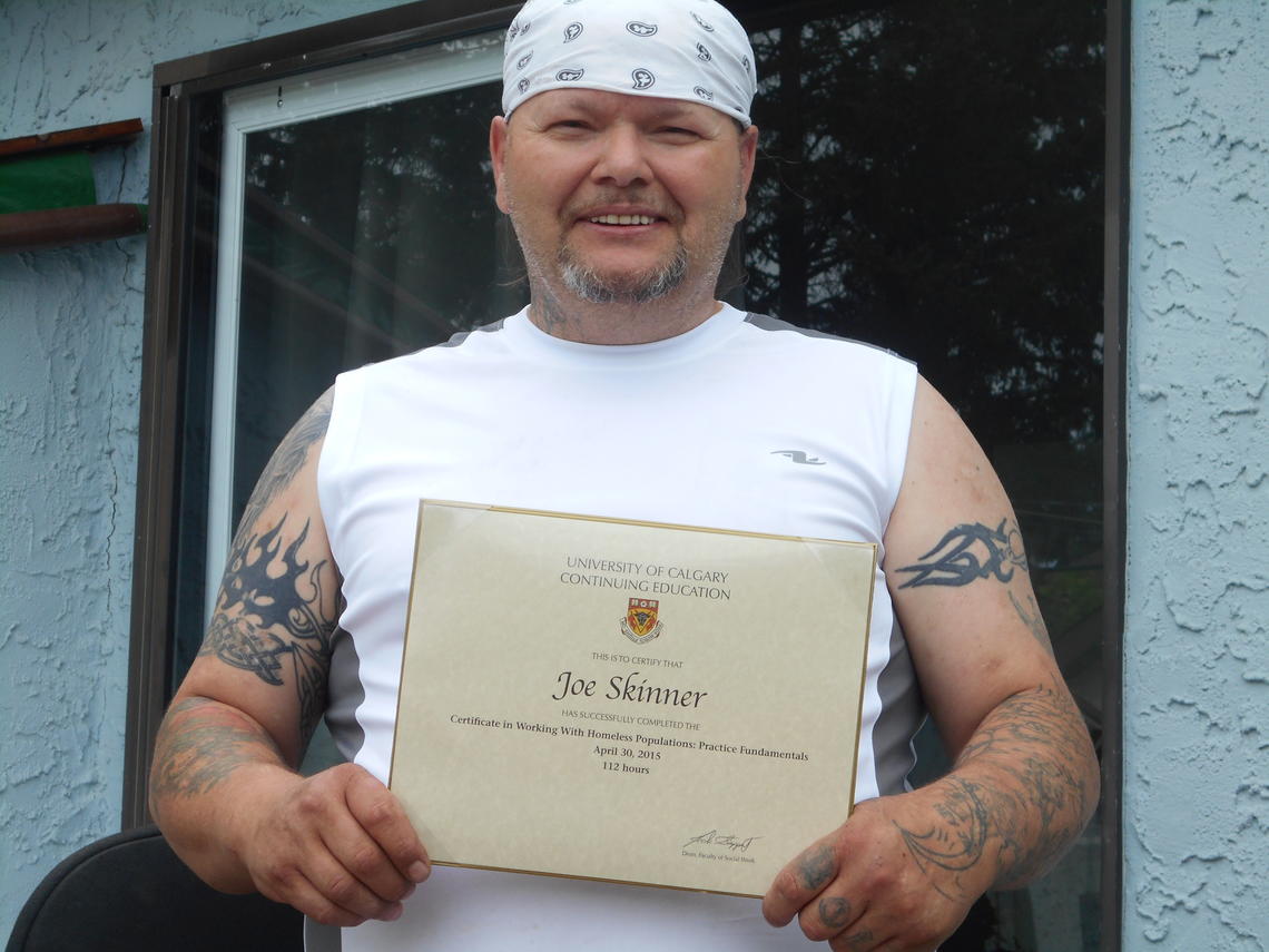 Joe Skinner proudly displays his WHP certificate. While he’s faced many hardships in his life, Skinner is rising to the top thanks to some dedicated helping hands.