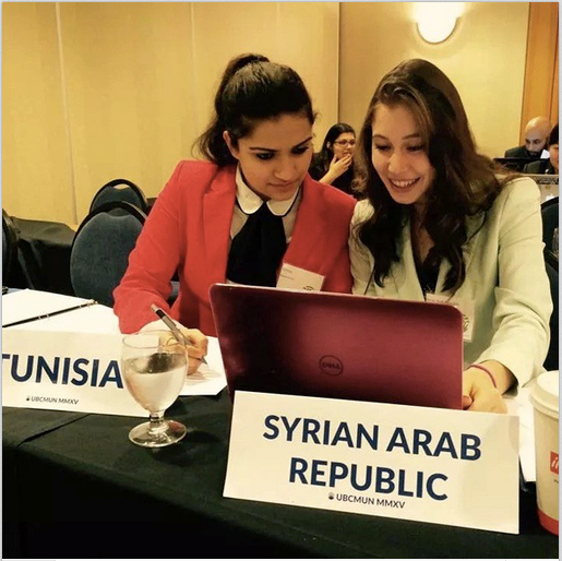 University of Calgary Model UN team member Bareerah Rab, left, as Tunisia in the Economic and Social Council for Western Asia, discussing water rights.