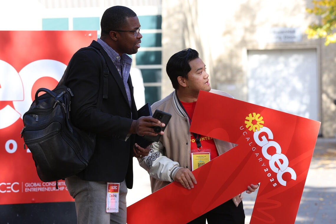 A man holding a sign