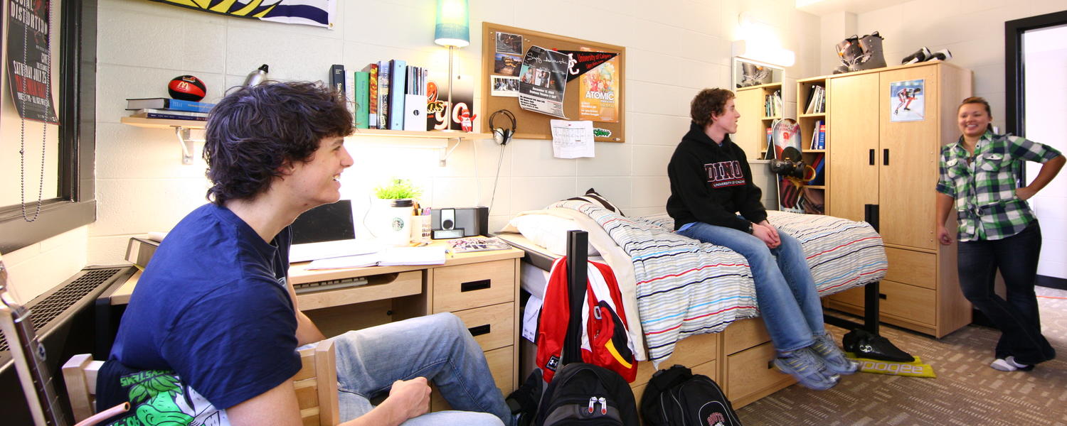 students hanging out in a dorm.