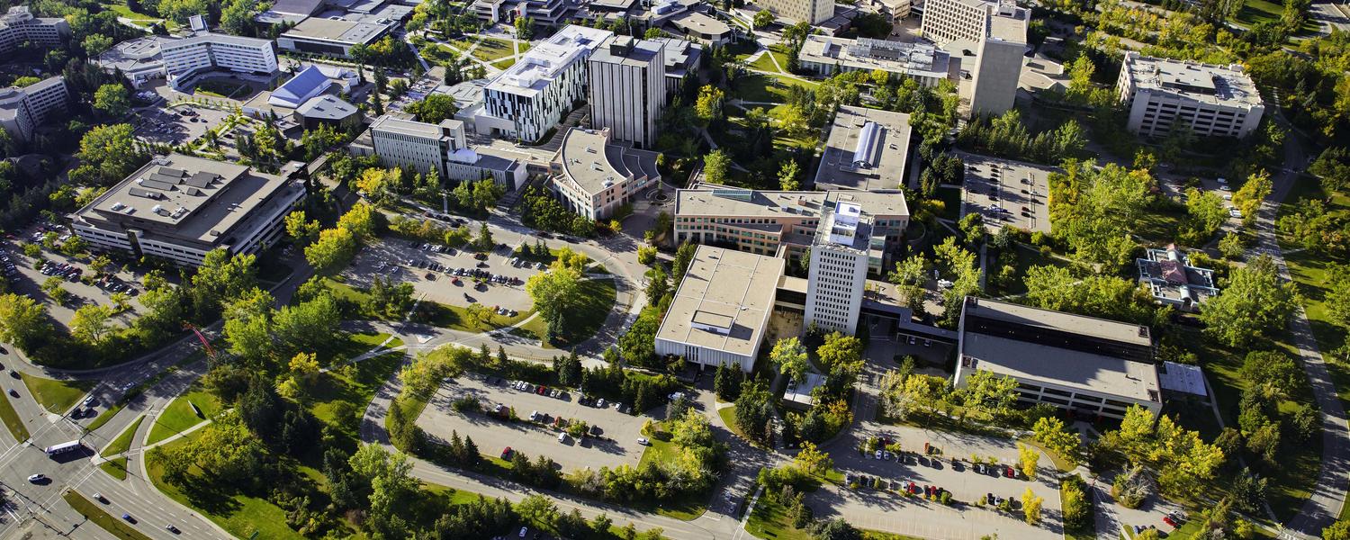 Aerial of main University of Calgary buildings and parking lots