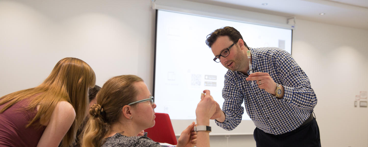 University of Calgary staff members learn how to administer Naloxone, a medication used to reverse the effects of an opioid
