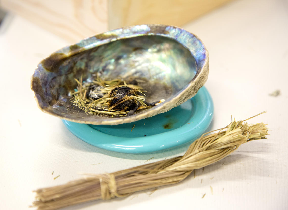 Image of burning sage for smudge Image of burning sage for smudge