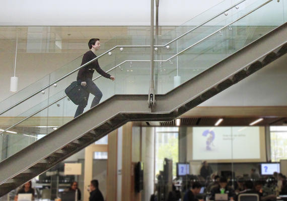 Walking up the stairs.