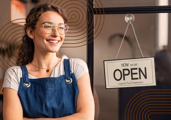 Business Playbook Business Owner with Open Sign
