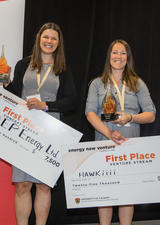 Competitors holding cheques