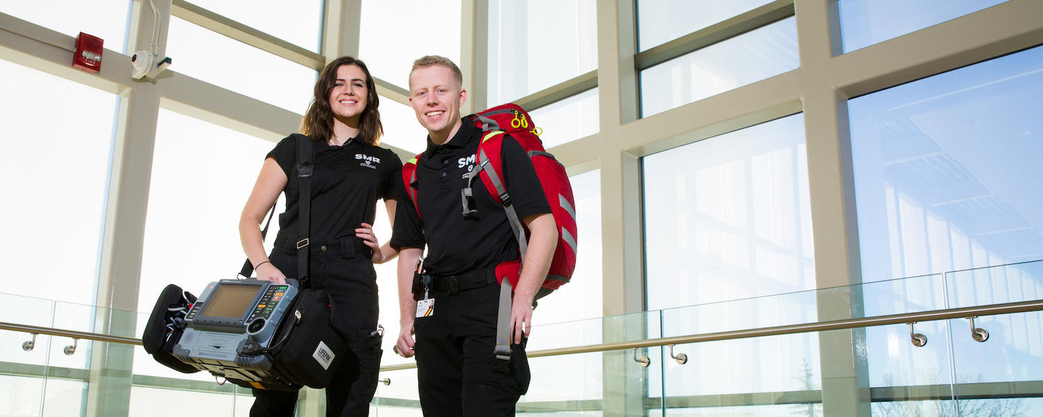 two student medical response volunteers in uniform