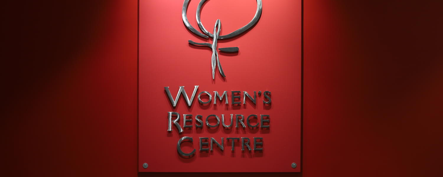 red wall with the Women's Resource Centre logo