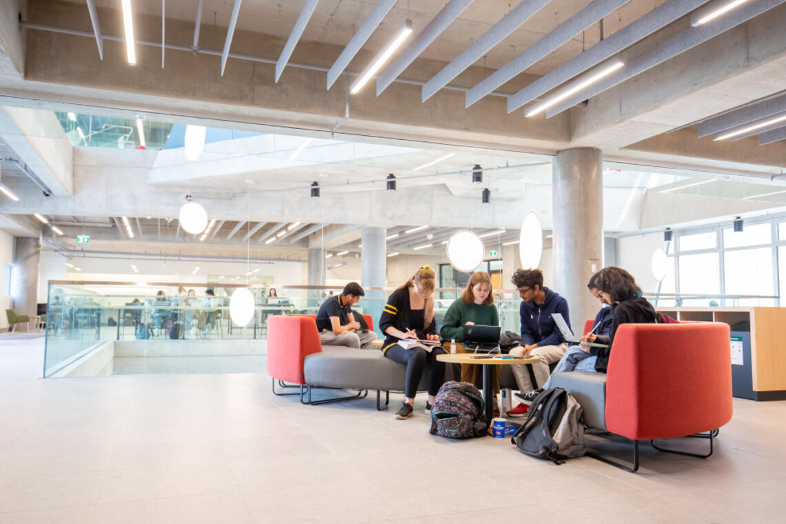 Group of students in a study area at Hunter Student Commons