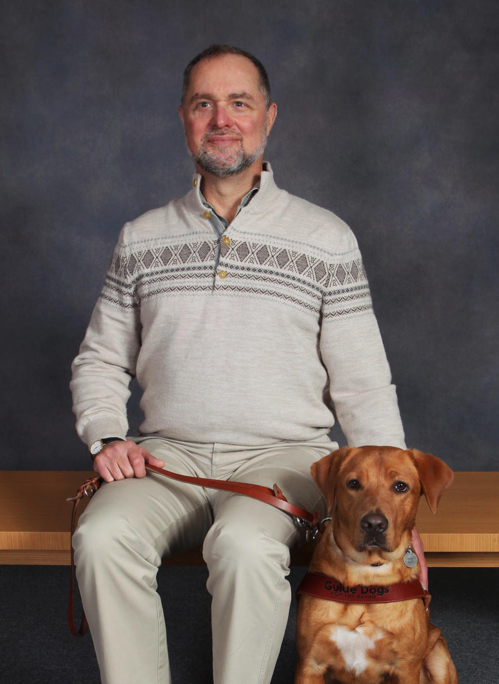 Michael Gottheil, and his service dog Kirby. Kirby is a male Yellow Labrador Retriever.