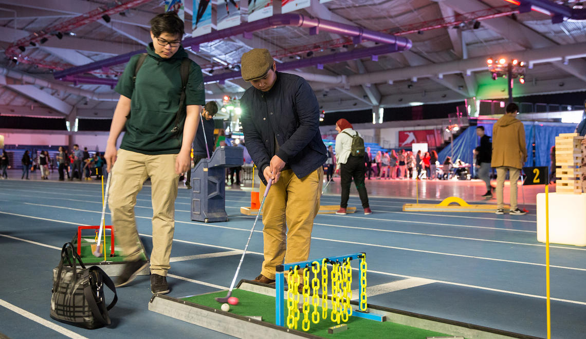 Students golfing at the 2019 event