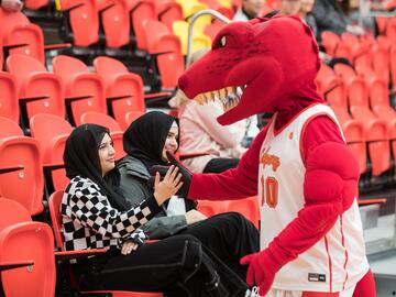 UCalgary’s mascot Rex, engaging with newly admitted students at the You at UCalgary event.