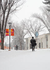 People walking on main campus during winter