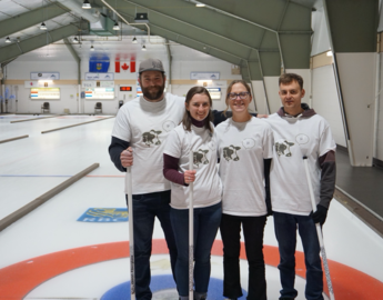 Rachel with grad students at CSEG curling tournament