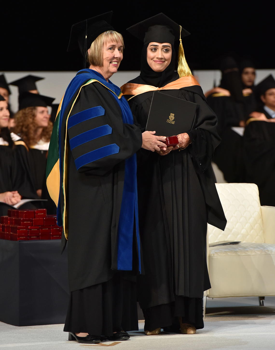 Dean Deborah White with a graduating student at the May 13 convocation ceremonies in Qatar.