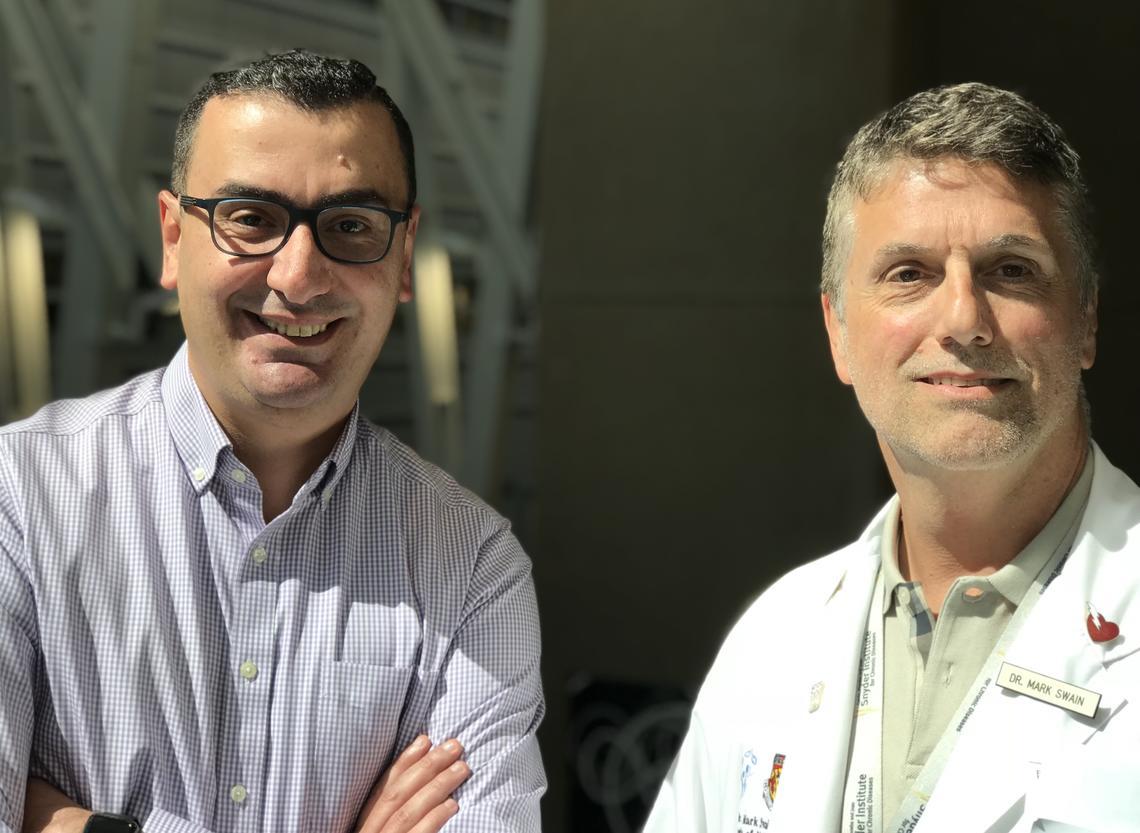 A Cumming School of Medicine collaboration is leading to a promising treatment option for people with primary biliary cholangitis. Abdel Aziz Shaheen, left, a gastroenterolist and epidemiologist, worked with Mark Swain, a liver specialist and clinician scientist, to make this discovery.