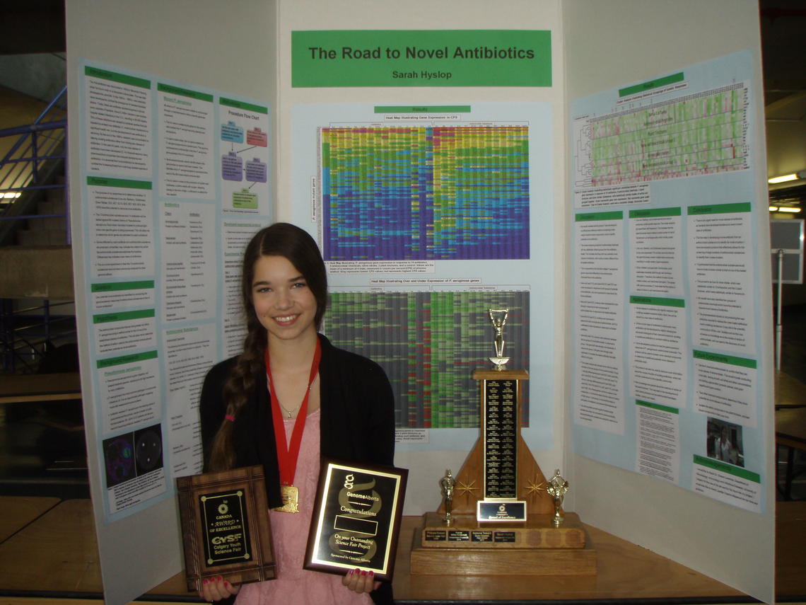 Fifth-year geology student Sarah Hyslop with her gold-medal winning 2012 Calgary Youth Science Fair project, The Road to Novel Antibiotics. She is helping award medals at this year’s science fair.