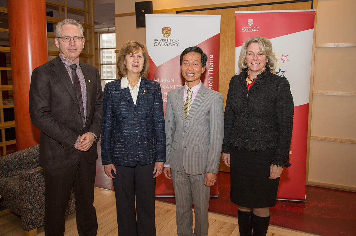From left, Ed McCauley, vice-president (research), Anne Katzenberg, assistant vice-president (research), Hieu Van Ngo, associate professor, Faculty of Social Work and Elizabeth Cannon, president and vice-chancellor.
