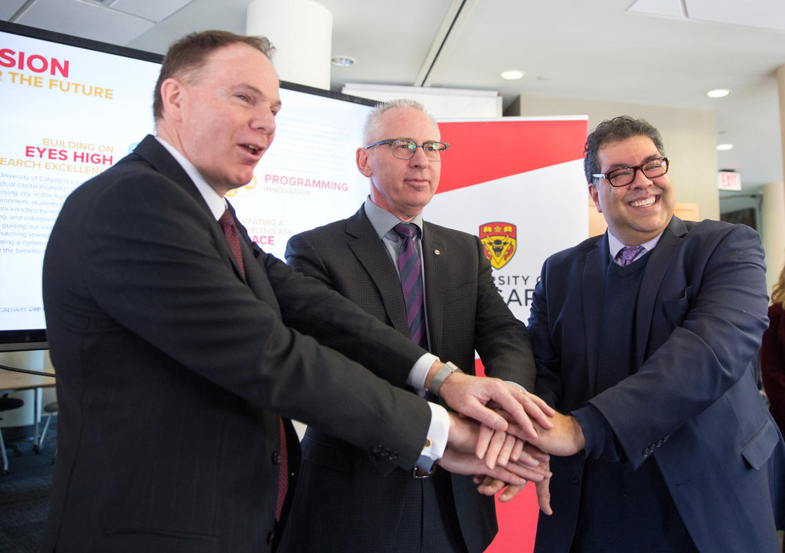 From left: Barry Munro, chair of the board of directors of the Opportunity Calgary Investment Fund, Ed McCauley, president and vice-chancellor of the University of Calgary, and Calgary Mayor Naheed Nenshi announce $8.5 million in funding for the Life Sciences Innovation Hub at University Research Park.