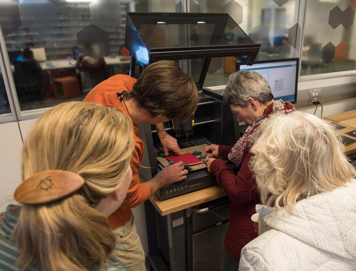 The makerspace in Lab NEXT is equipped with a 3D carving machine and a bank of 3D printers. 