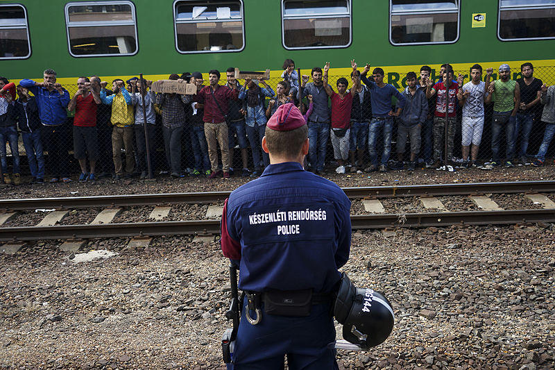 Syrian refugees protest at the platform of Budapest Keleti railway station. Media portrayals can make refugees seem less than human, which has far-reaching implications in Western society. Victoria Esses presents on the topic Feb. 13 as part of the University of Calgary Faculty of Social Work's Positive Disruption Series.