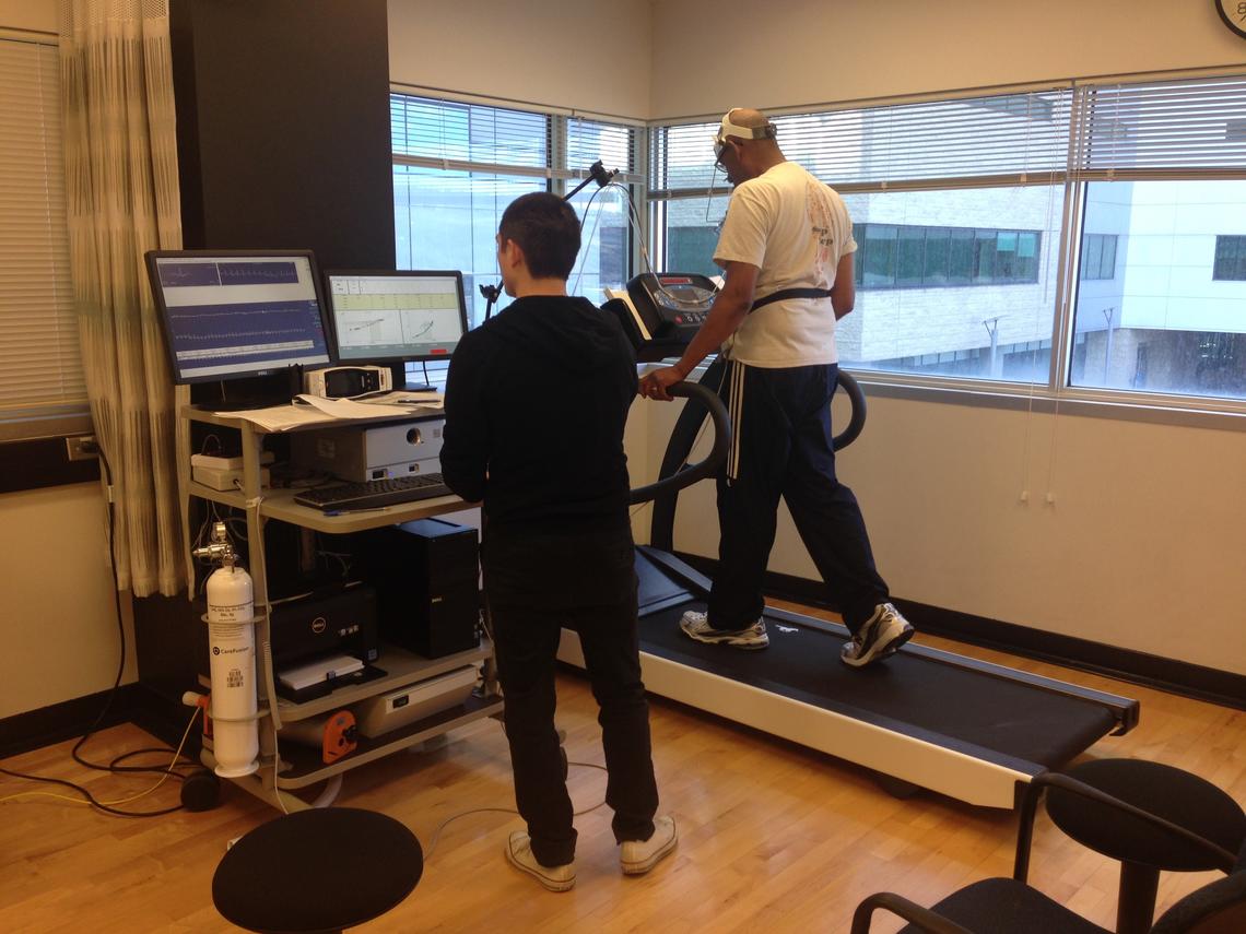 A Brain in Motion research assistant conducts a maximal aerobic capacity (VO2max) test, considered the gold standard for fitness testing, on a Brain in Motion study participant. 