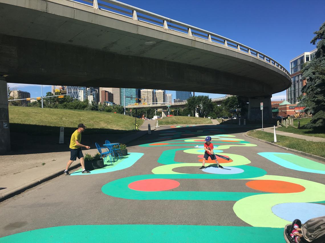 The “whimsical walk,” designed in collaboration with University of Calgary students, invites pedestrian participation through creative play opportunities.