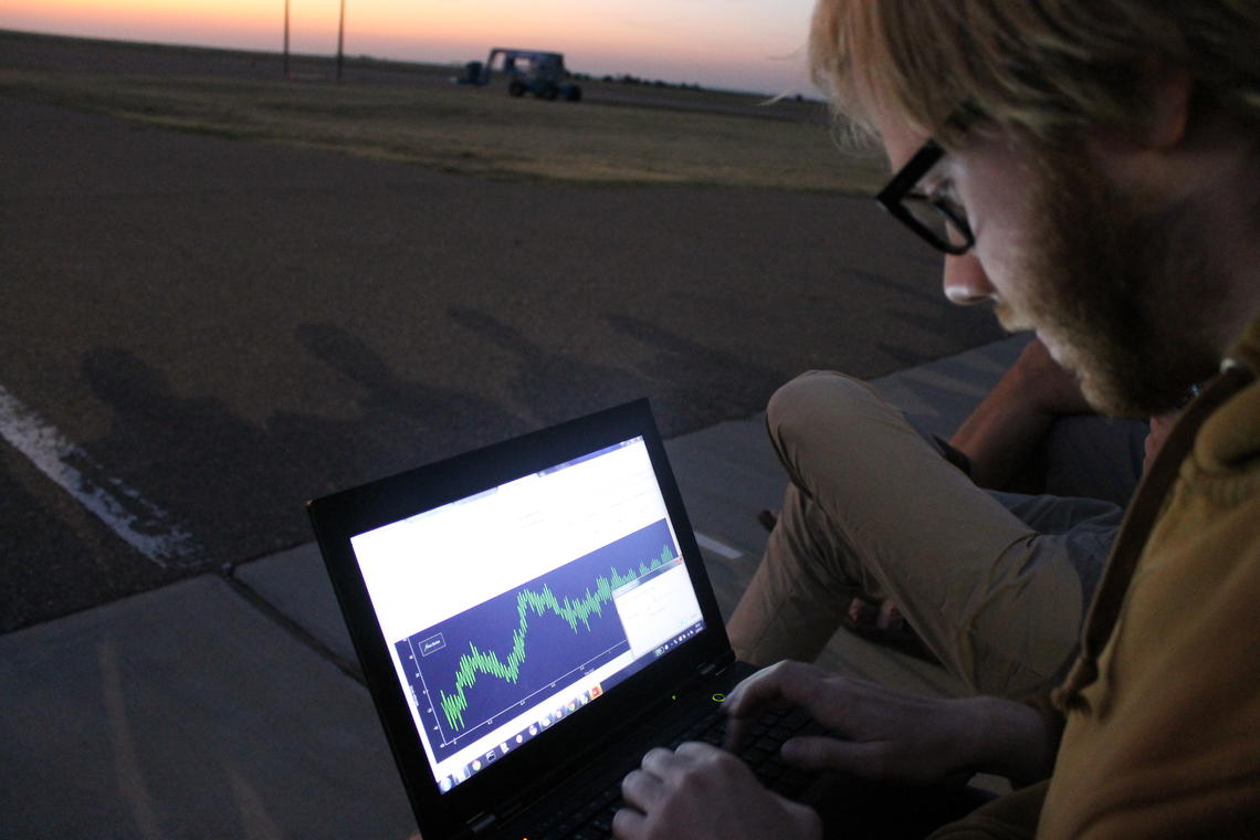 Cooper Duffin observes preliminary data shortly after the balloon was launched  at 3:30 a.m. 