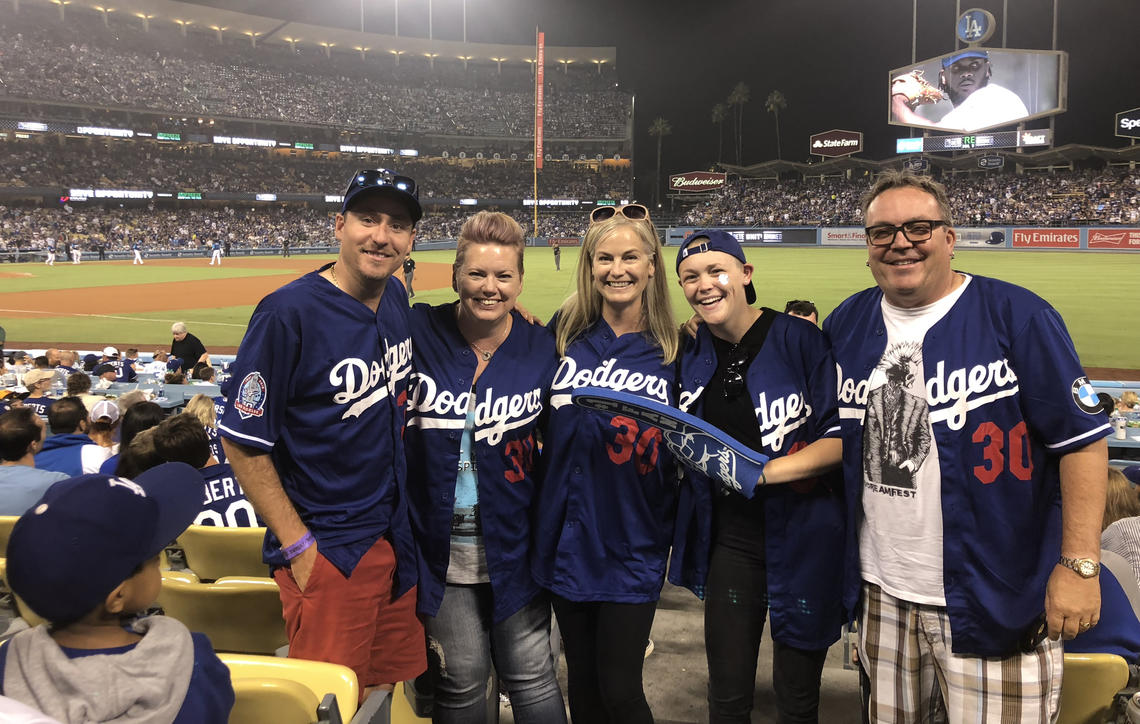 Class of 2021 graduate Brooklyn Sheppard, fourth from left, attends a Dodgers baseball game in Los Angeles with her parents and friends. From left, Kevin Blackburn, Terra Connors, Maureen Sheppard (mother), Brooklyn, and Mike Sheppard (dad).