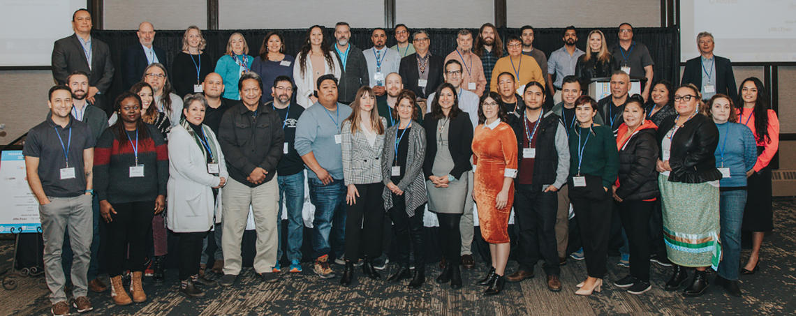 UCalgary scholar Gregory Taylor, back row-right, joined delegates from across Canada and U.S. at the 2022 Indigenous Connectivity Summit in Winnipeg.