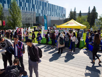 First-year students visit The Campus Expo, an outdoor resource featuring key campus services, and student organizations.
