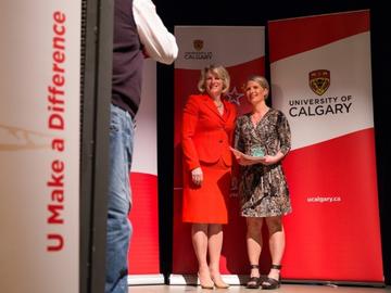 UCalgary recognizes the importance of thanking employees for the great contributions they make. The university’s 2018 Recognition Awards event honoured 15 and 25-year-long service recipients, as well as 19 individual and group U Make a Difference Award recipients whose performance, commitment and service make the university a great place to learn and work. Pictured: Elizabeth Cannon, past President; Natasha Kenny, Director of the Educational Development Unit for the Taylor Institute for Teaching and Learnin