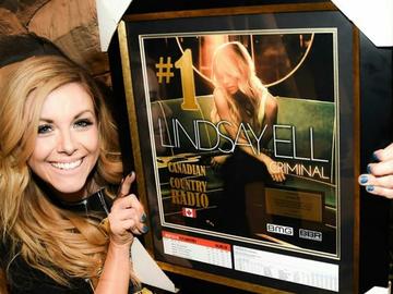 Lindsay’s label, BBR Music Group in Nashville, presented a #1 plaque for current single, Criminal