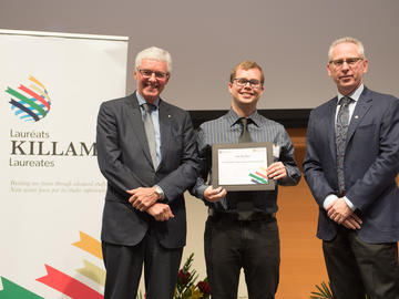 Killam Predoctoral Laureate Seth McAfee, Chemistry, with Killam Trustee Kevin Lynch (left) and Dr. Ed McCauley, vice-president (research)