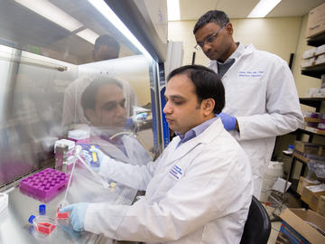 Dr. Dylan Pillai, study lead, and first author Dr. Abu Naser Mohon in the lab at the Snyder Institute, University of Calgary.