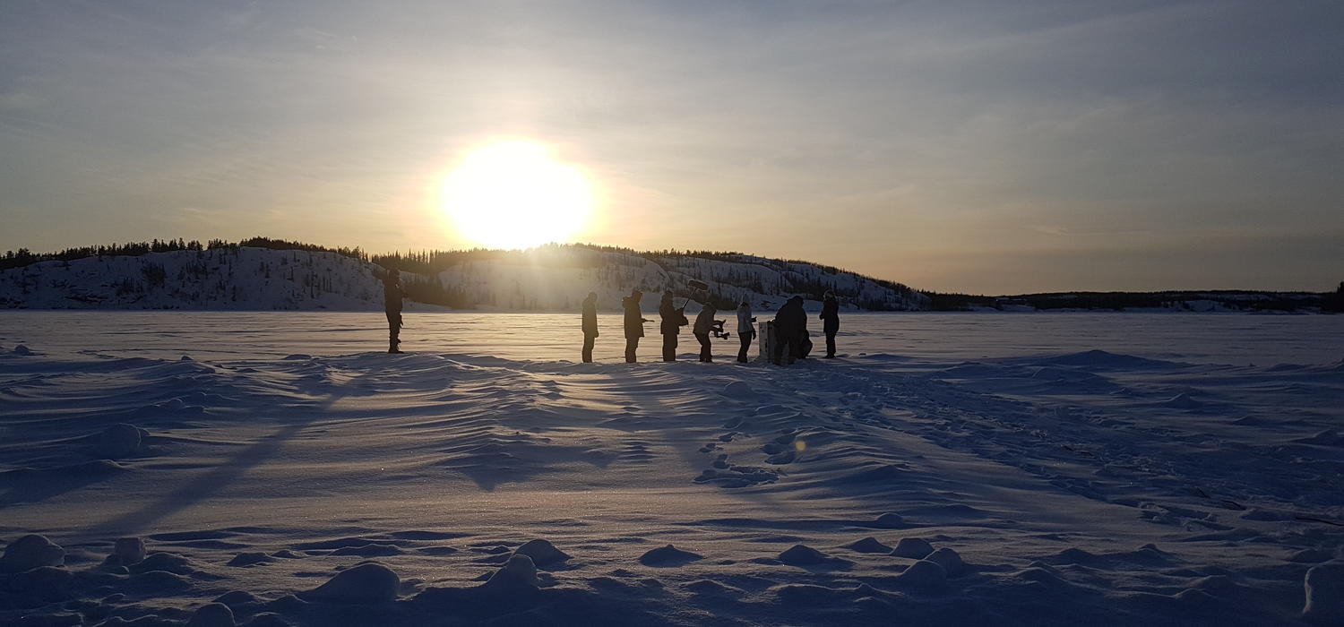 Huddled next to a frozen lake in the Northwest Territories, the Faculty of Science-led team from the University of Calgary conducts experiments in the spring of 2018.