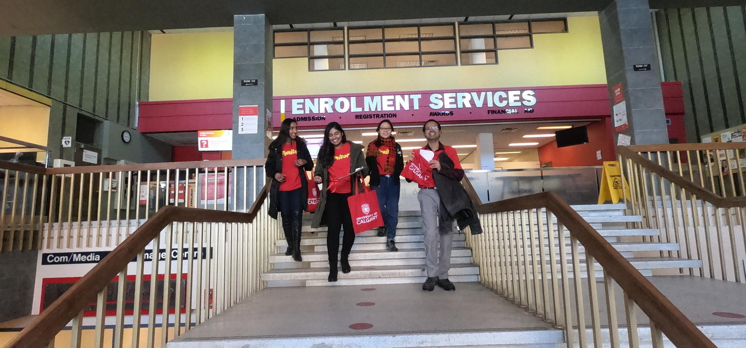 Students (from left) Fariah Thaseen, Dilpreet Samra, Linh Phan and Bala Bhaskar have been delivering Ignitor packages to faculty/staff donors this week. Development and Alumni Engagement photos