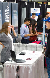 UCalgary students speak with potential employers during a career fair on campus on Sept. 26, 2017. Photos by Riley Brandt,, University of Calgary