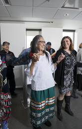 Members of Manitoba First Nations celebrate with Werklund School staff at the signing ceremony marking a new partnership.