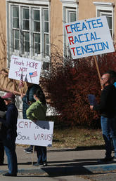 People protest critical race theory outside the offices of the New Mexico Public Education Department in November 2021.