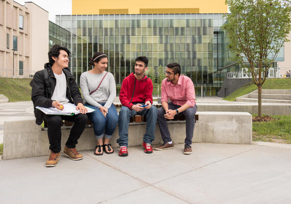 Students collaborating on campus 