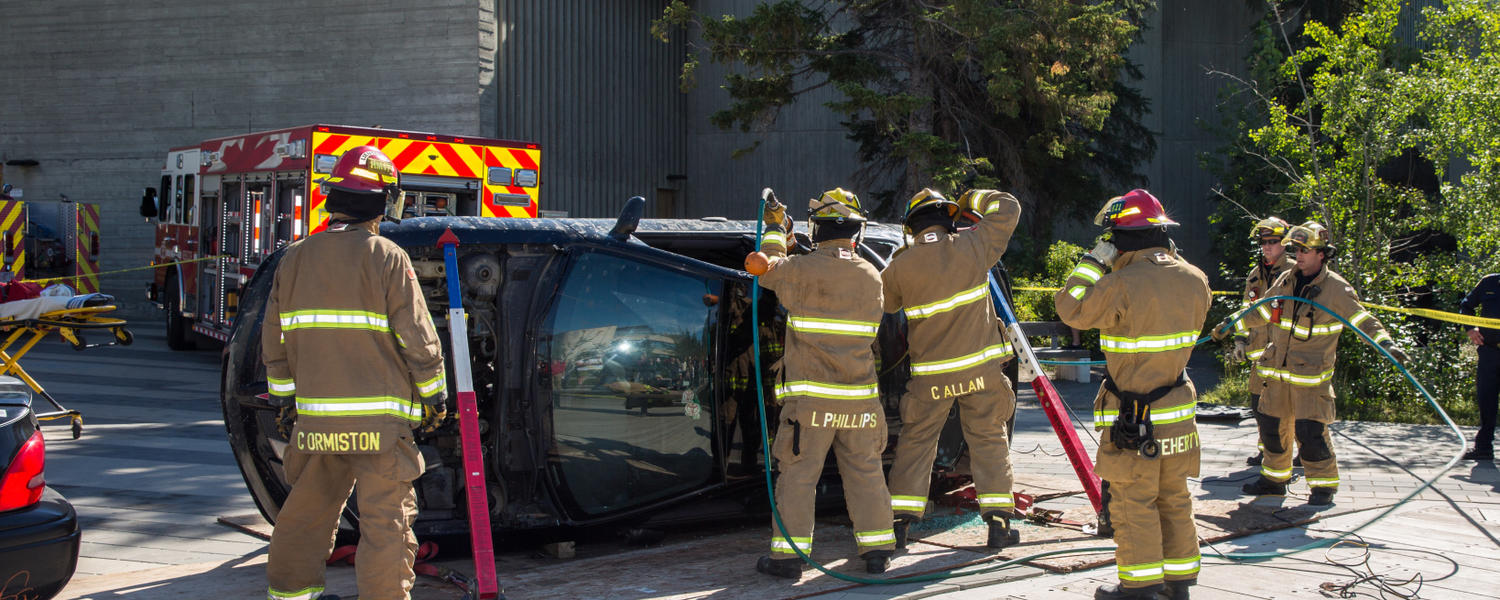 Firefighters demonstrate an emergency vehicle extraction