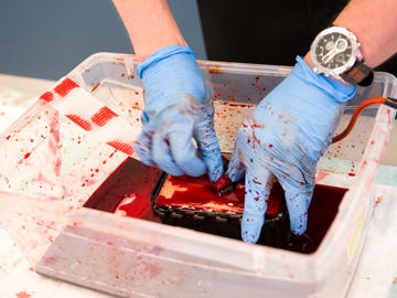 University of Calgary staff learn to use bleeding control kits at the Stop the Bleed training.