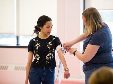University of Calgary staff learn to use bleeding control kits at the Stop the Bleed training.