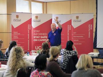 Gary McDougal, retired police officer and qualified hostage and crisis negotiator, discussed how to use awareness and risk assessment to minimize risk and enhance safety on and off campus.