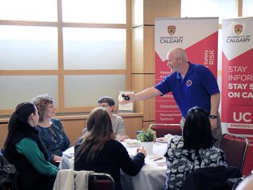 Gary McDougal, retired police officer and qualified hostage and crisis negotiator, discussed how to use awareness and risk assessment to minimize risk and enhance safety on and off campus.
